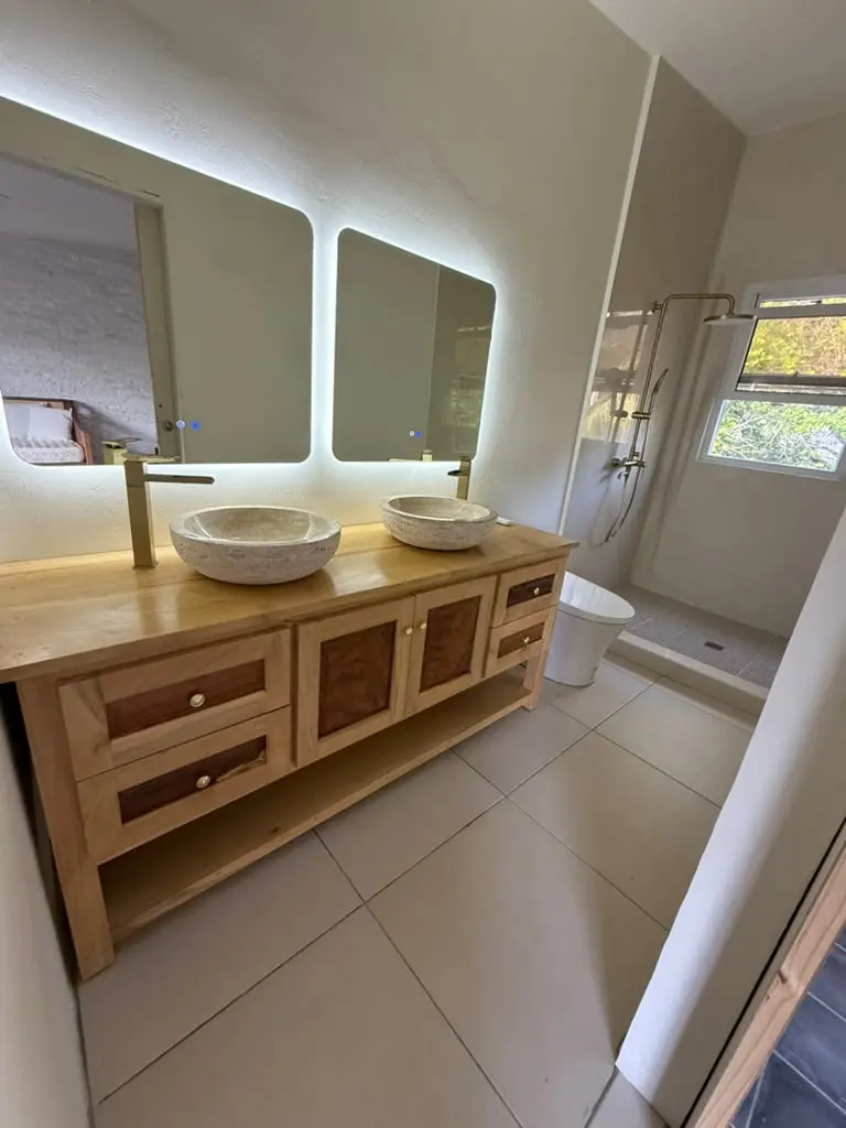 The In the Clouds suite ensuite bathroom with twin vessel sinks